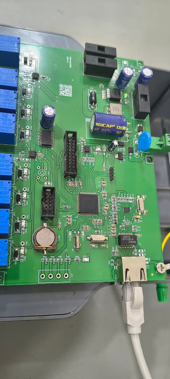 M100 master controller board connected over Ethernet, showing the microcontroller, real-time clock and connectors